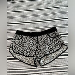 Black and white swim shorts. Size large.